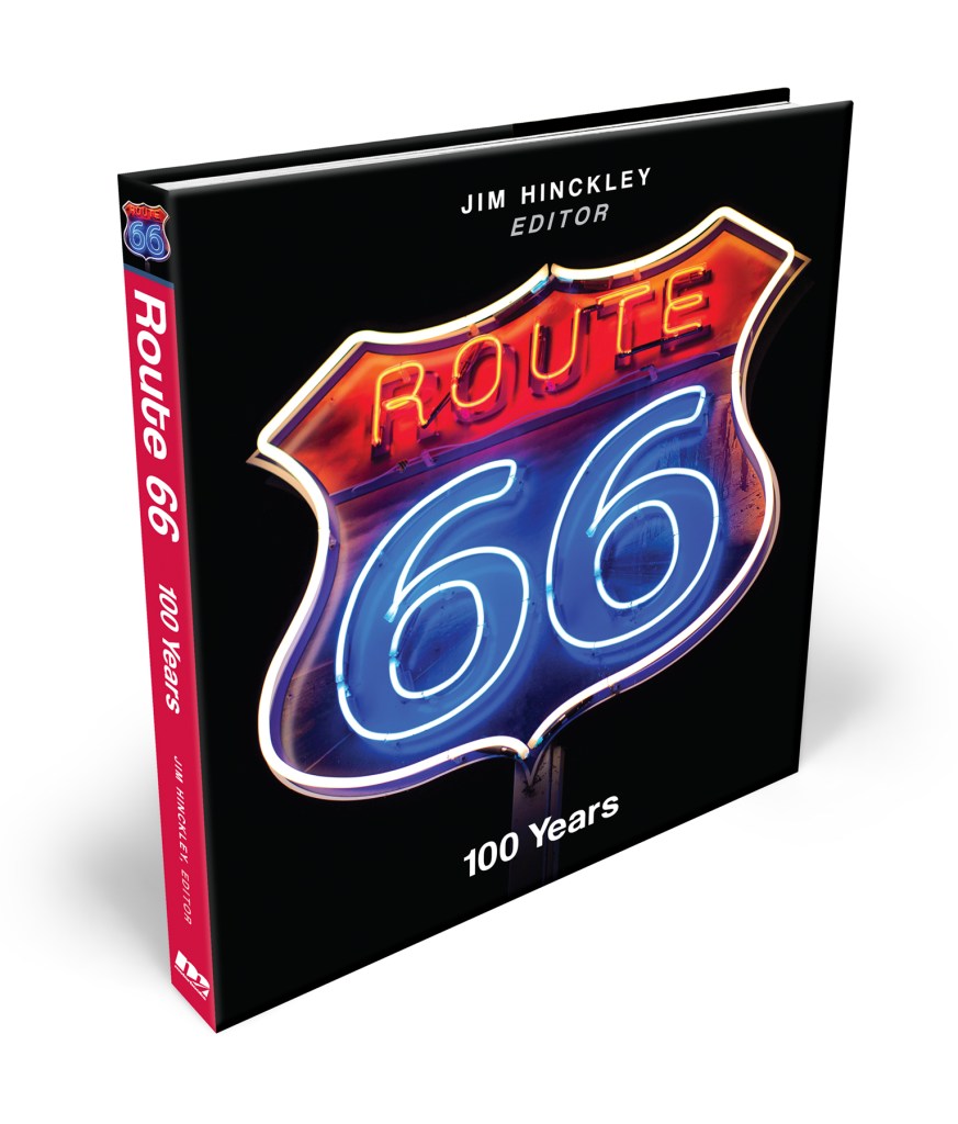 Book titled 'Route 66: 100 Years' edited by Jim Hinckley, featuring a neon sign design on the cover.